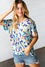 Blue & Orange Retro Floral V Neck Top