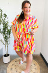 Eyes On You Coral & Yellow Geo Abstract Surplice Woven Romper